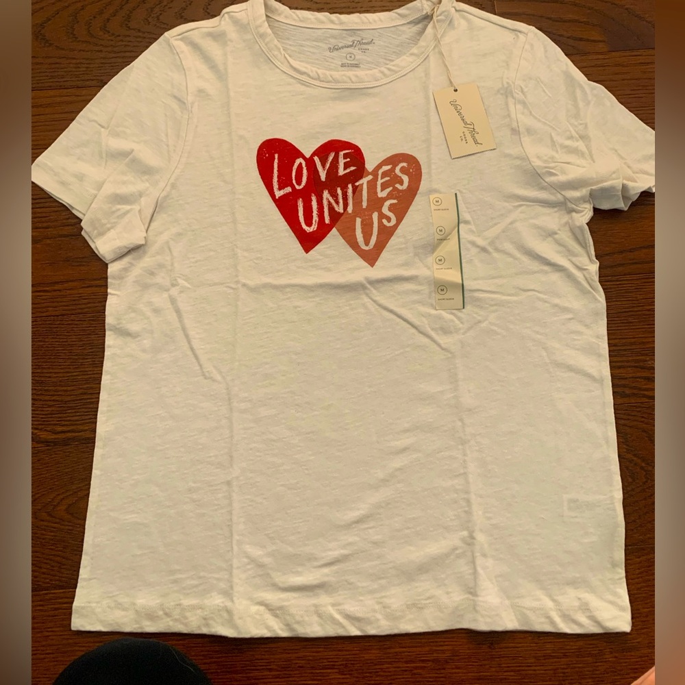 Women’s tshirt size M . New with tags.